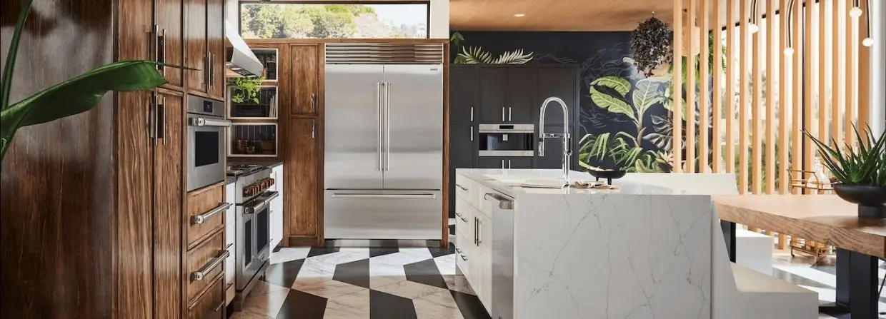 Finished kitchen with built in refrigeration, a professional range and wall ovens
